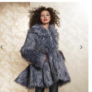 BNWT in the plastic faux fur jacket.